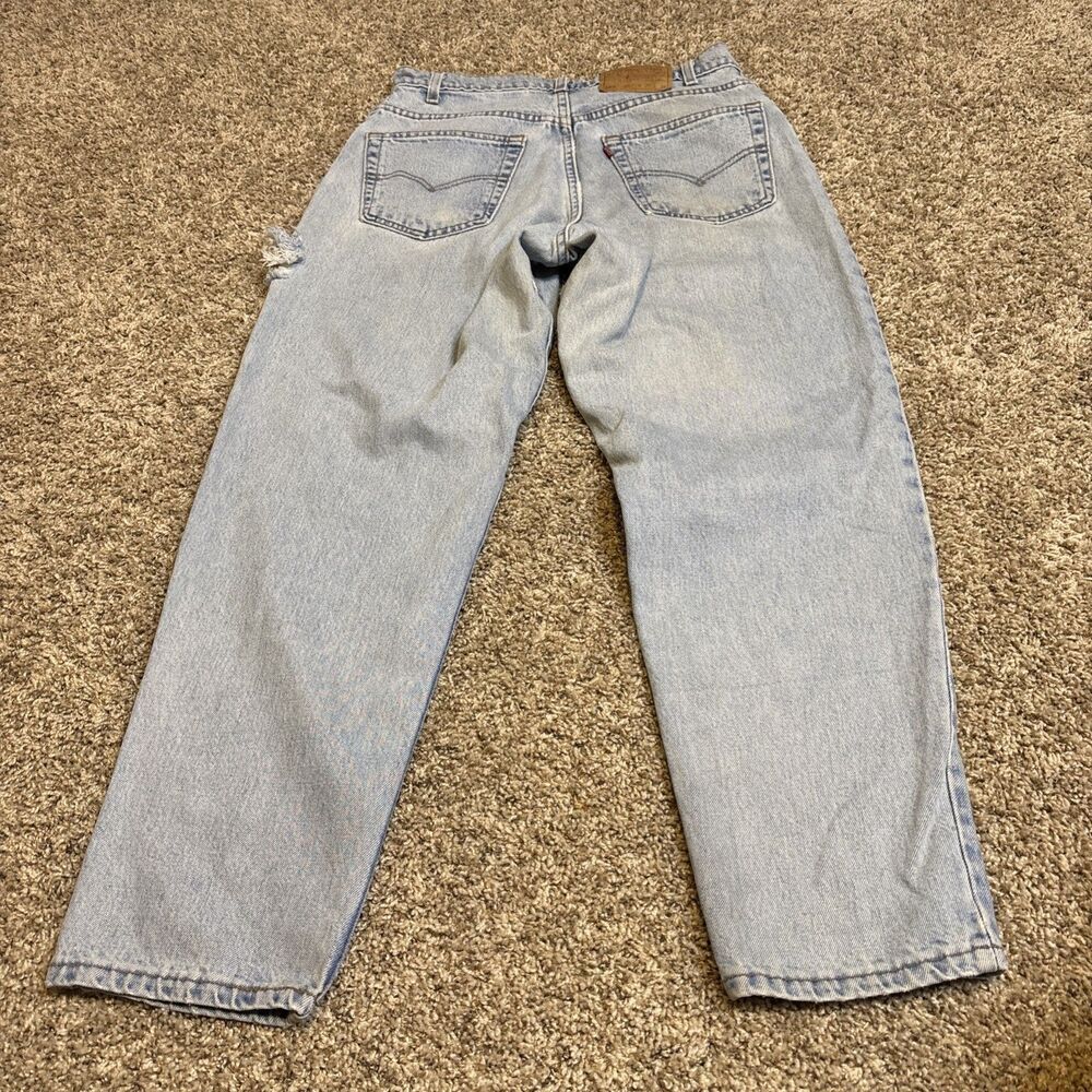 Vintage Levis 560 Jeans Mens 32x30 Blue Light Wash Baggy Wide Distressed USA 90s